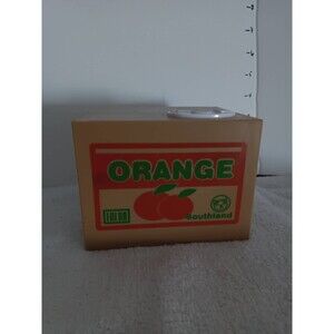 Electronic kitty coin bank in orange box